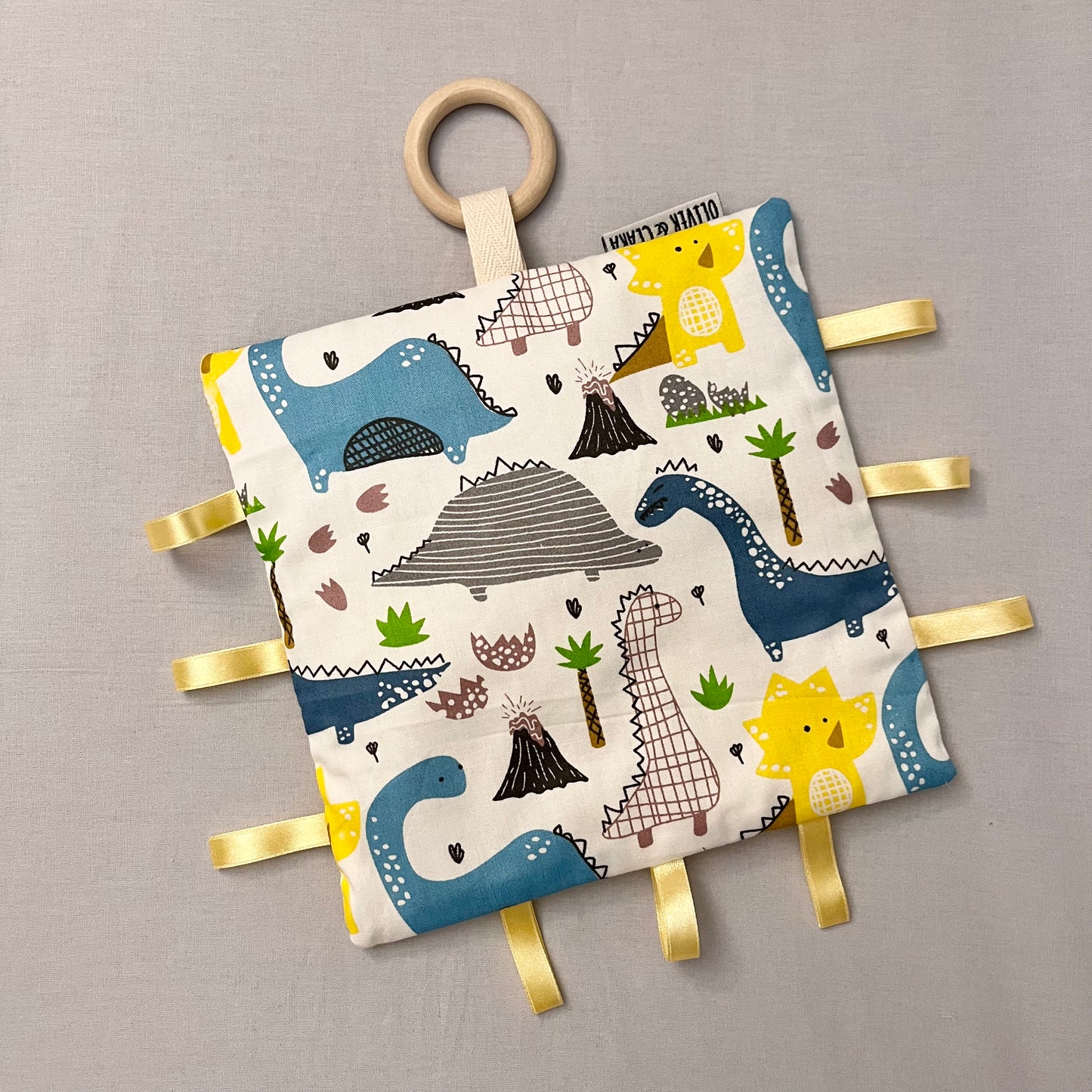 Mantita sensorial dino